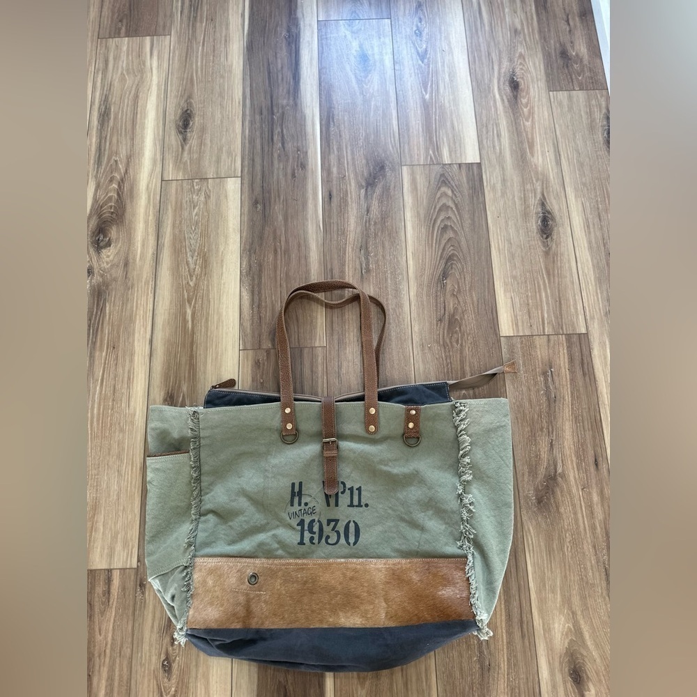 Myra Bag upcycled canvas & cowhide weekender bag